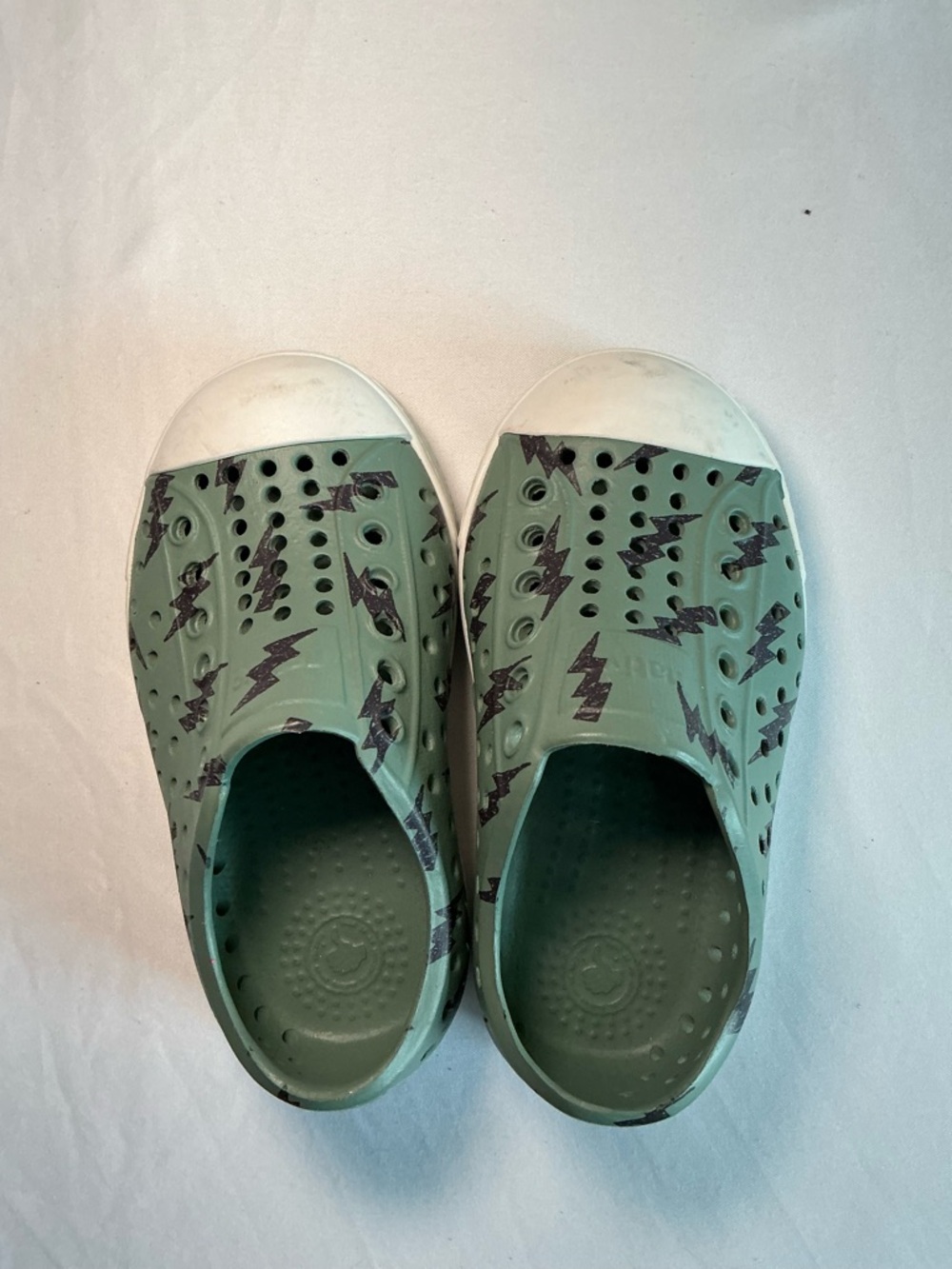 Native Shoes Kids Slip-On Shoes in Sage Green with Lightning Print